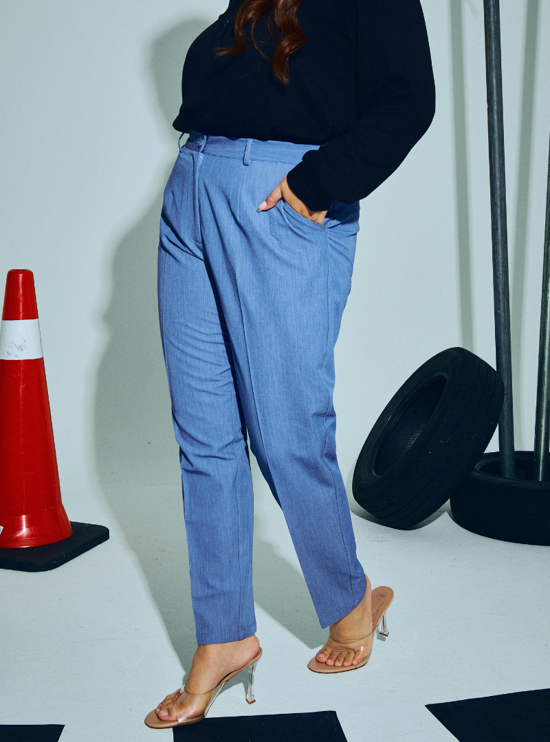 A woman wearing in Denim Blue Audrey Skinny Slacks