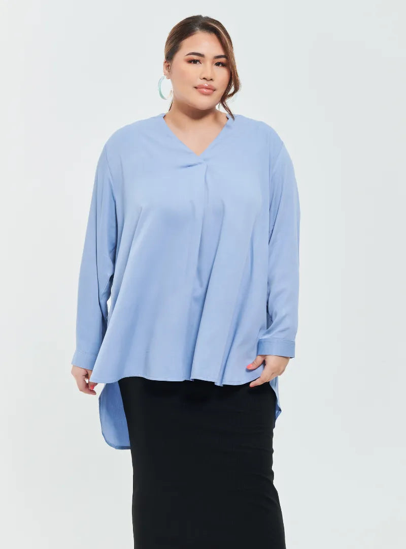 A woman dressed in Baby Blue Mandarin Collar Oversized Shirt