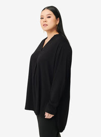 A woman dressed in Black Mandarin Collar Oversized Shirt