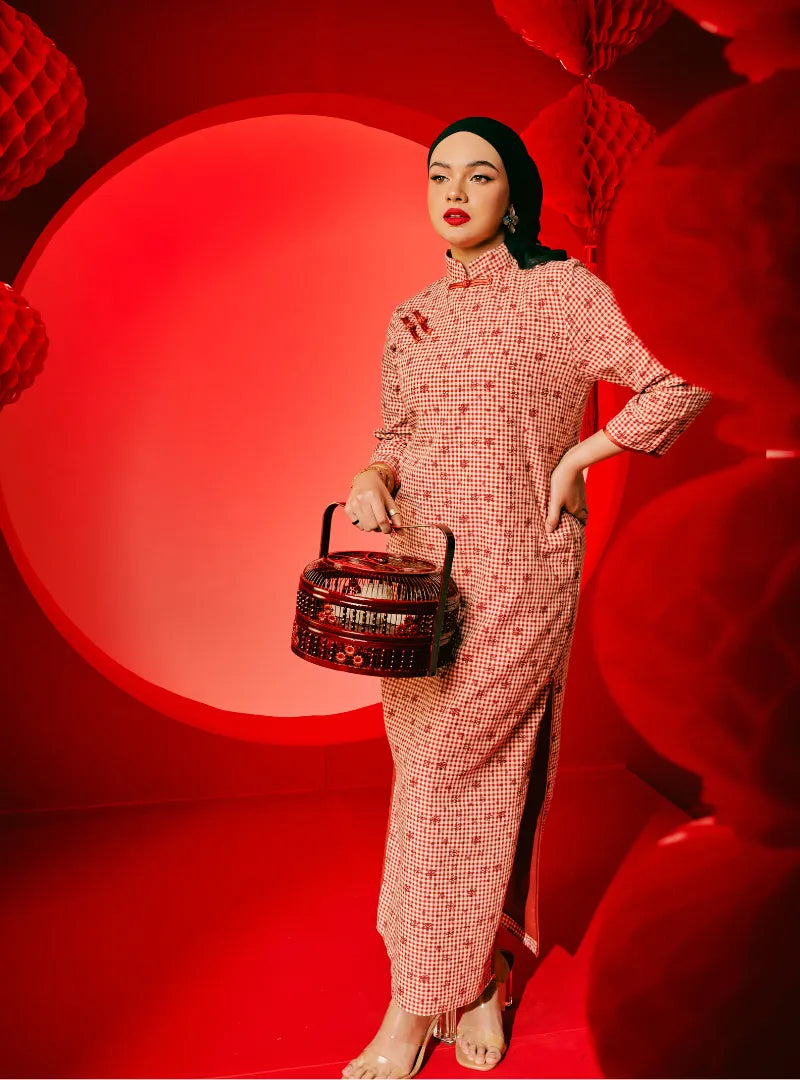 A woman dressed in Brick Red Nyok Jie Cheongsam Checked Midi Dress