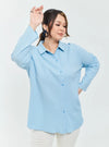 A woman dressed in Baby Blue Textured Shirt