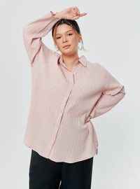 A woman dressed in Baby Pink Textured Shirt