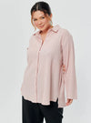 A woman dressed in Baby Pink Textured Shirt