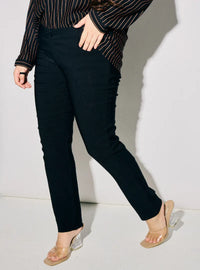 A woman wearing Black Dolly Skinny Trouser