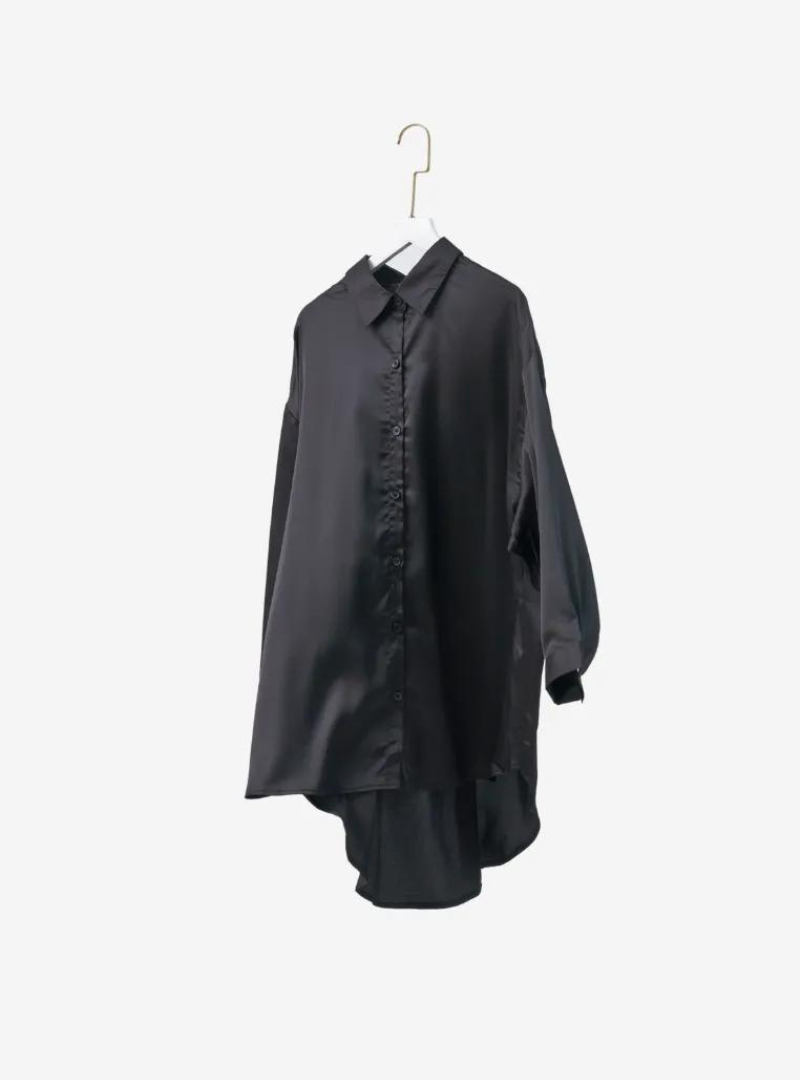 A woman dressed in Black Dropped Shoulder Satin Shirt