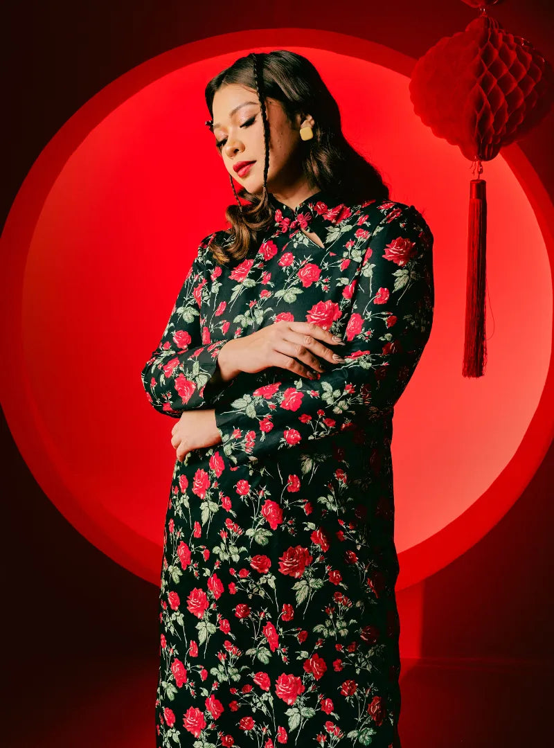 A woman dressed in Black Fung Jie Cheongsam Dress