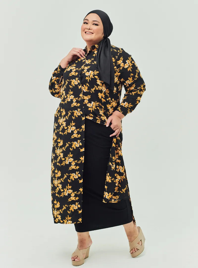 A woman dressed in Black Gold Flower Longline Printed Shirt Dress