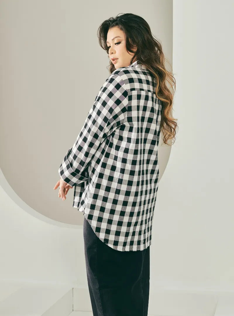 A woman dressed in Black Jennie Oversized Checked Cotton Shirts