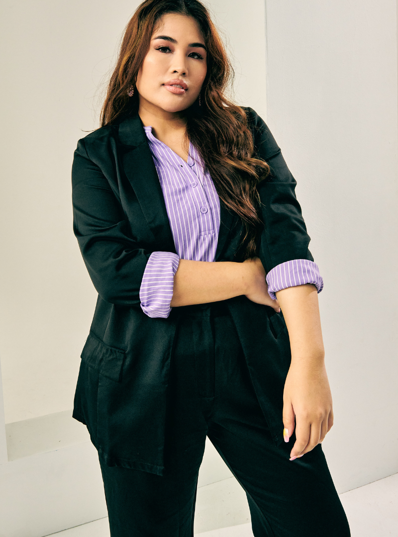 A woman dressed in Black Lapel Collar Oversized Blazer Set
