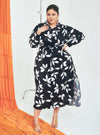 A woman dressed in Black Lily Longline Printed Shirt Dress