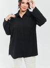 A woman dressed in Black Textured Shirt