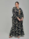 A woman dressed in Black Tun Sarah 3D Chiffon Wrap Kurung