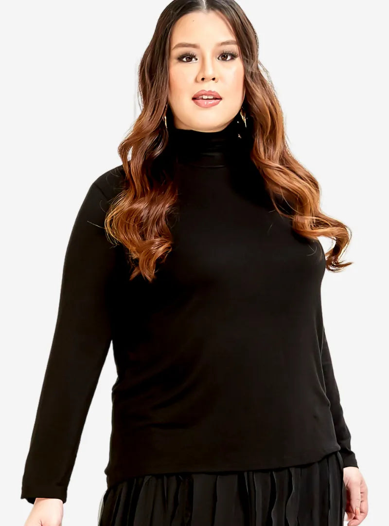 A woman dressed in Black Turtle Neck - AT01