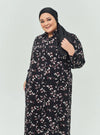 A woman dressed in Black Willow Longline Printed Shirt Dress