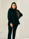 A woman dressed in Black Ezzah Eyelet Doll Top