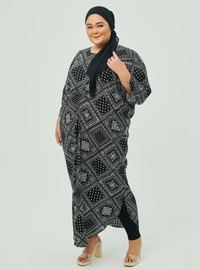 A woman dressed in Block Print Essential Front Knot Kaftan