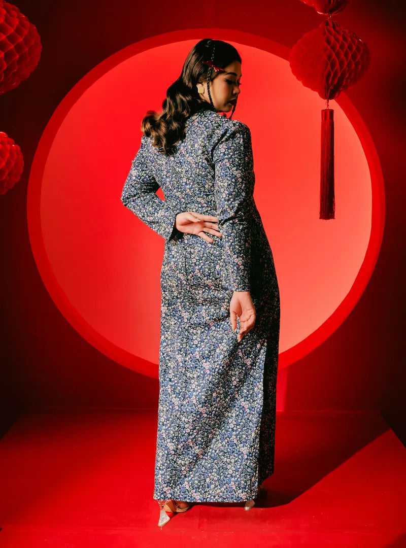 A woman dressed in Blue Breath Yun Jie Cheongsam Dress