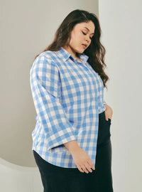 A woman dressed in Blue Jennie Oversized Checked Cotton Shirts