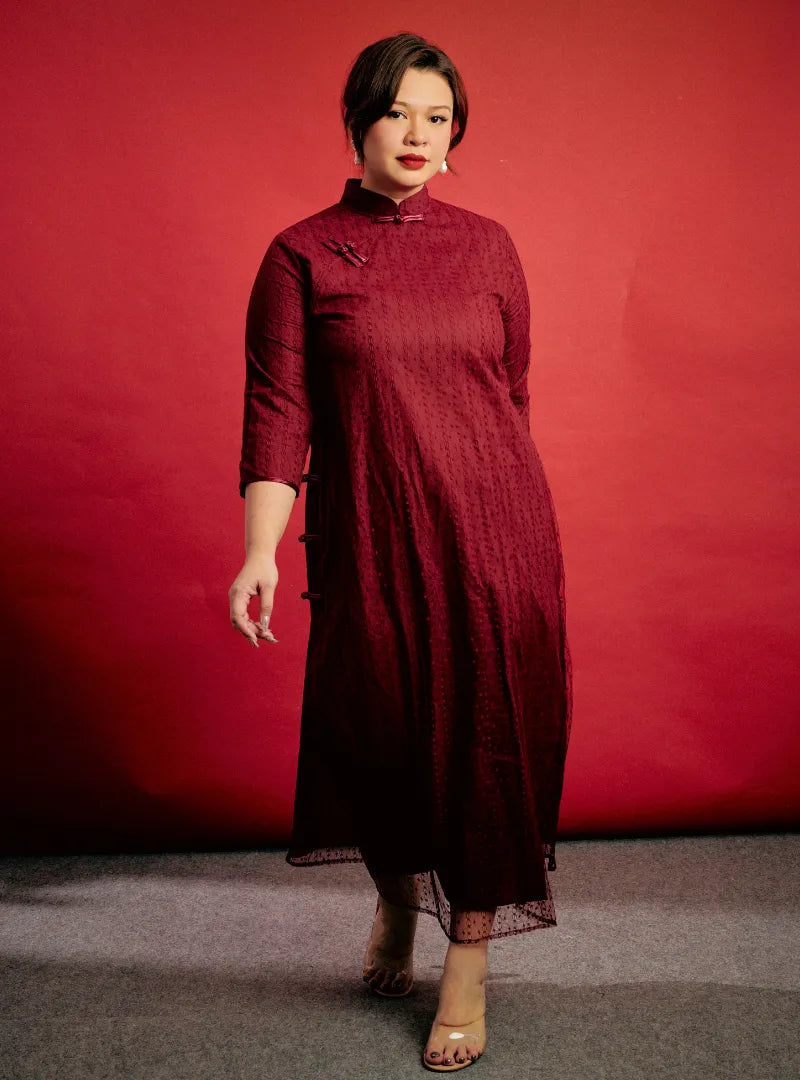  A woman dressed in Burgundy Zen Gu Striped Lace Cheongsam Dress