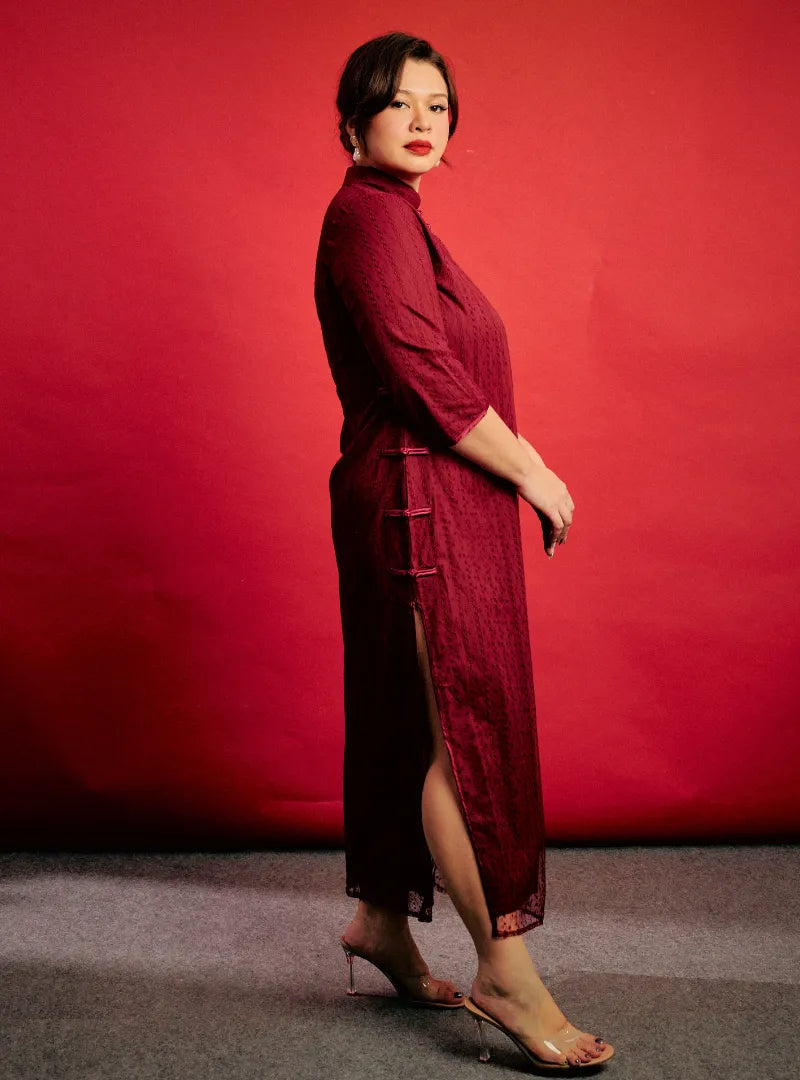  A woman dressed in Burgundy Zen Gu Striped Lace Cheongsam Dress