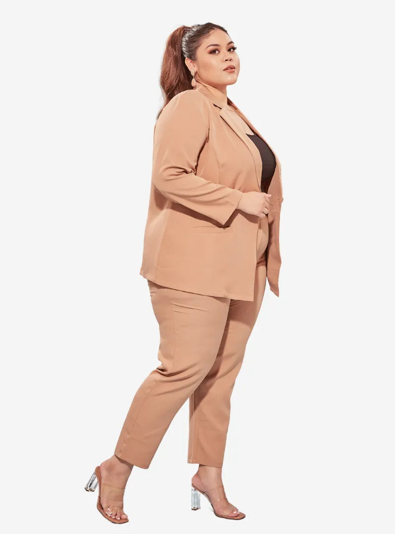 A woman dressed in Camel Oversized Blazer