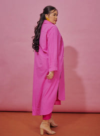 A woman dressed in Candy Pink Longline Oversized Cotton Shirt Dress