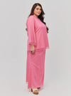 A woman dressed in Candy Pink Tun Aminah Organza Basic Kurung