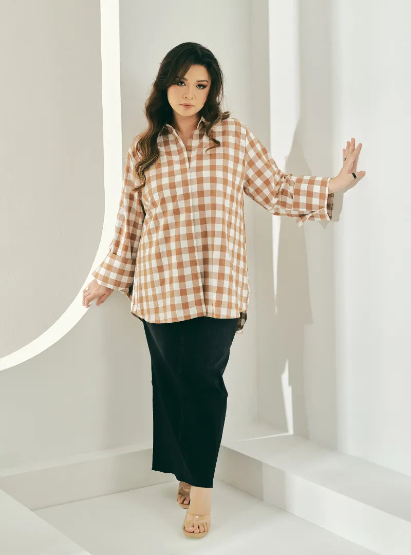 A woman dressed in Caramel Jennie Oversized Checked Cotton Shirts