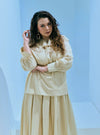 A woman dressed in Champagne Haness Ruffles Collar Cotton Set