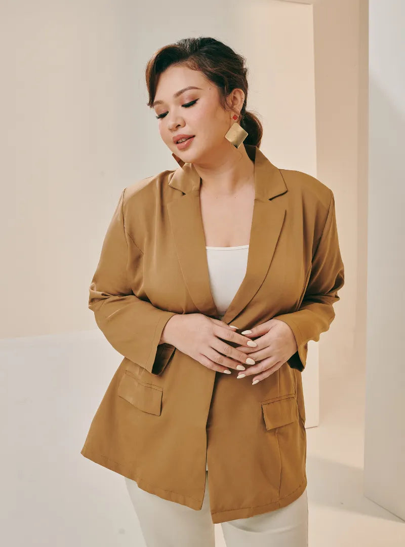 A woman wearing Cookie Dough Lapel Collar Oversized Blazer