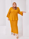 A woman Dressed in Mustard Crystal Lebaran Pleated Kurung