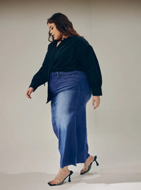 A woman wearing in Denim Blue Tasha Denim Long Skirt