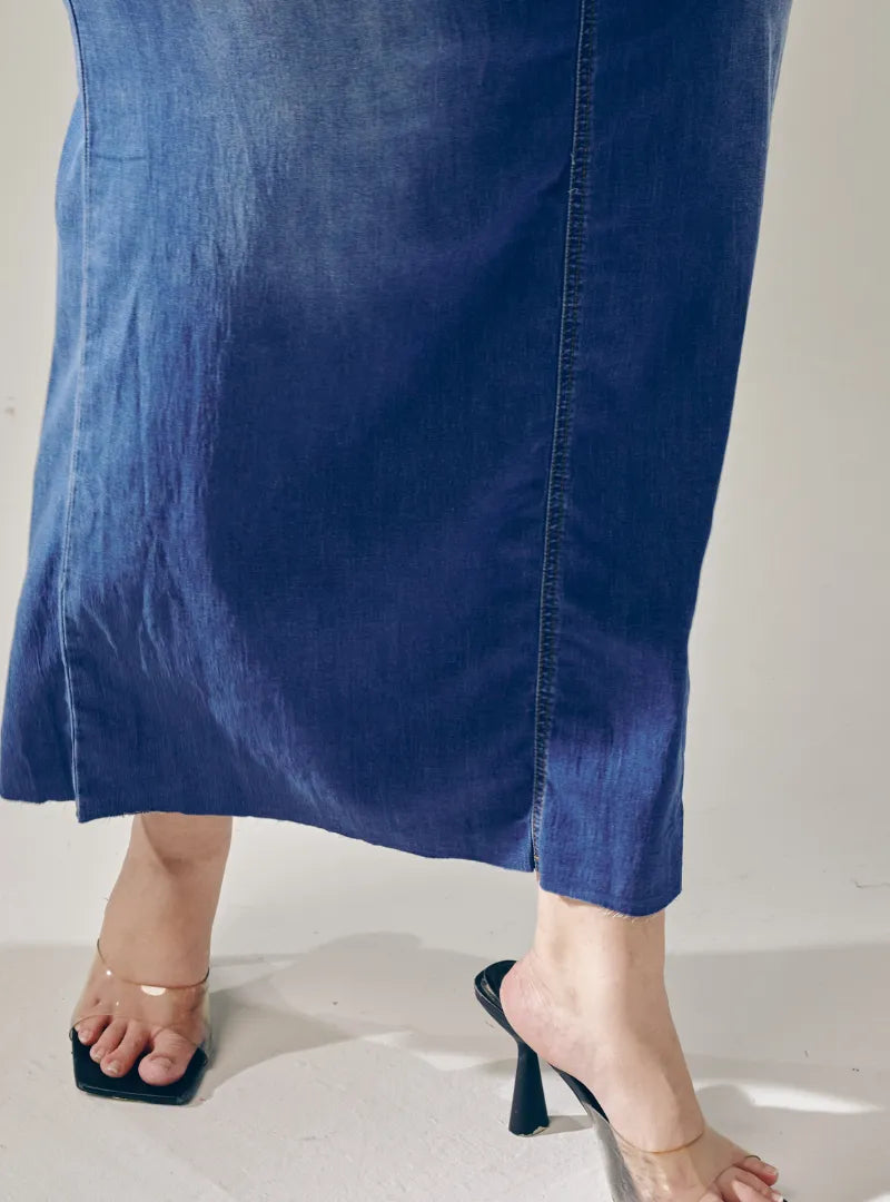 A woman wearing in Denim Blue Tasha Denim Long Skirt