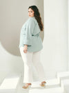 A woman dressed in Dusty Blue Jasper Mandarin Collar Basic Shirt