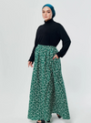 A woman wearing Emerald English Printed Cotton Maxi Skirt