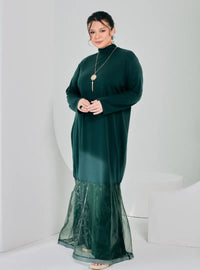 A woman dressed in Emerald Ms Lana High Neck Organdy Dress