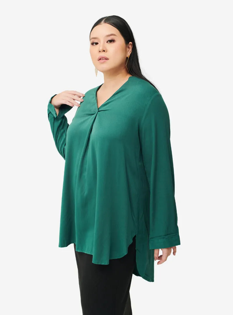 A woman dressed in Emerald Mandarin Collar Oversized Shirt