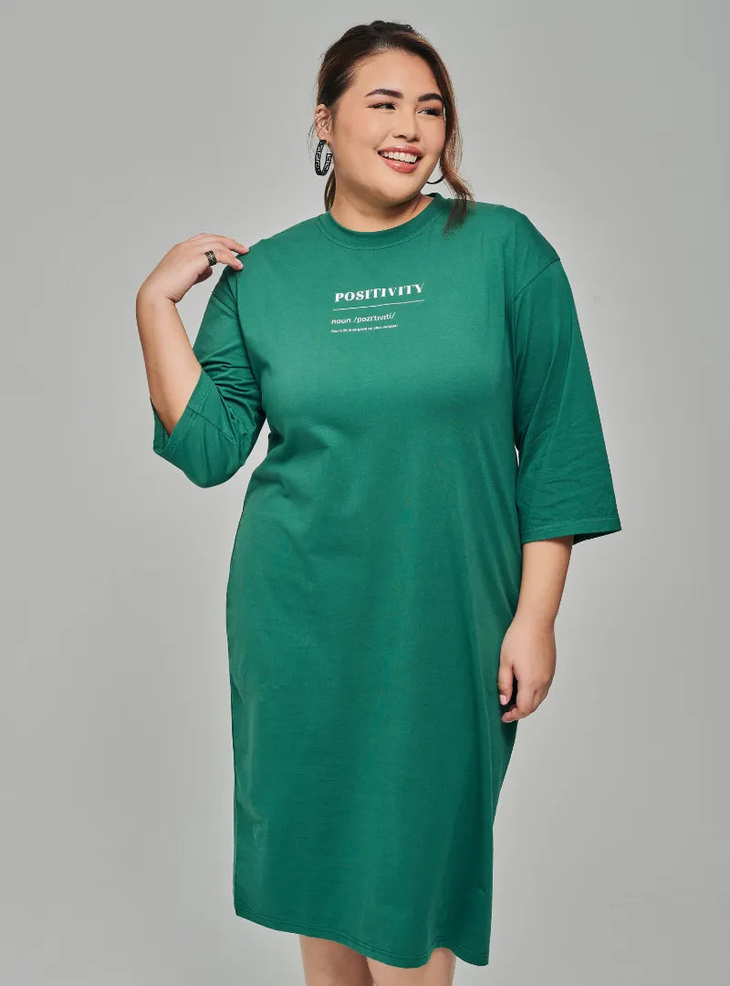 A woman dressed in Emerald Green Smooth Cotton T-Shirt Dress