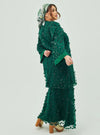 A woman dressed in Emerald Green Tun Sharifah Lace Kurung