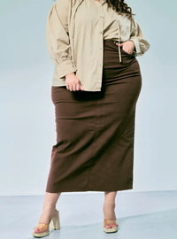 A woman wearing in Espresso Zalia Denim Long Skirt