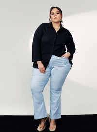 A woman wearing Faded Blue Ms Nadia Bootcut Trouser