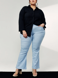 A woman wearing Faded Blue Ms Nadia Bootcut Trouser