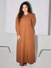 A woman dressed in Ginger Brown Marsya Cotton Long Sleeve Dress