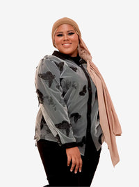 A woman dressed in Grey 3D Ashley Butterfly Shirt