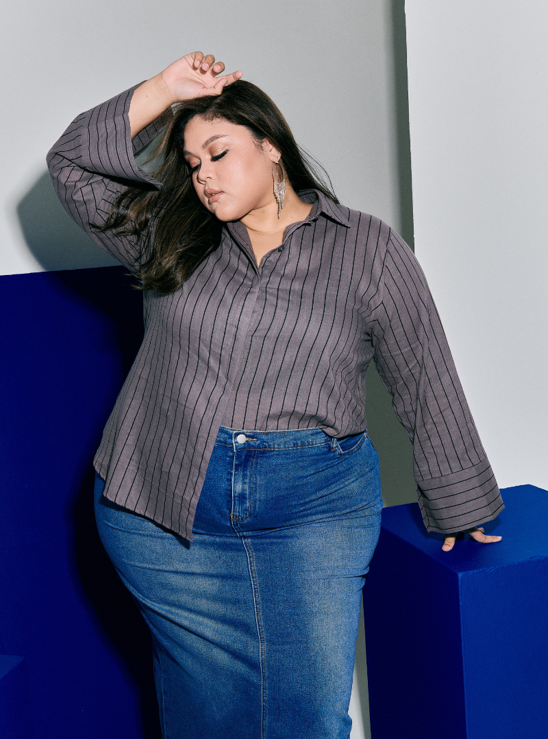 A woman wearing Grey Janiper Striped Shirt