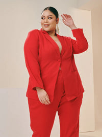 A woman dressed in Hot Red Oversized Blazer