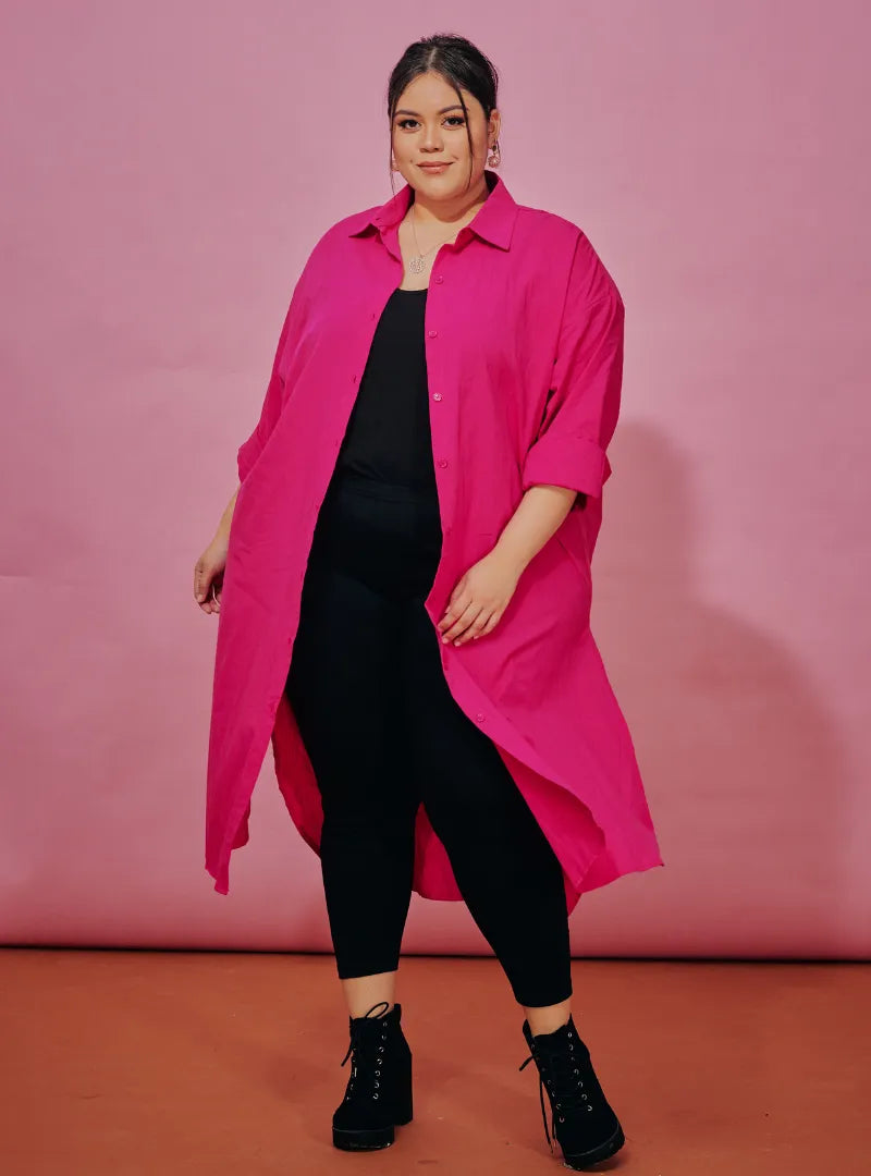 A woman dressed in Hot Pink Longline Oversized Cotton Shirt Dress