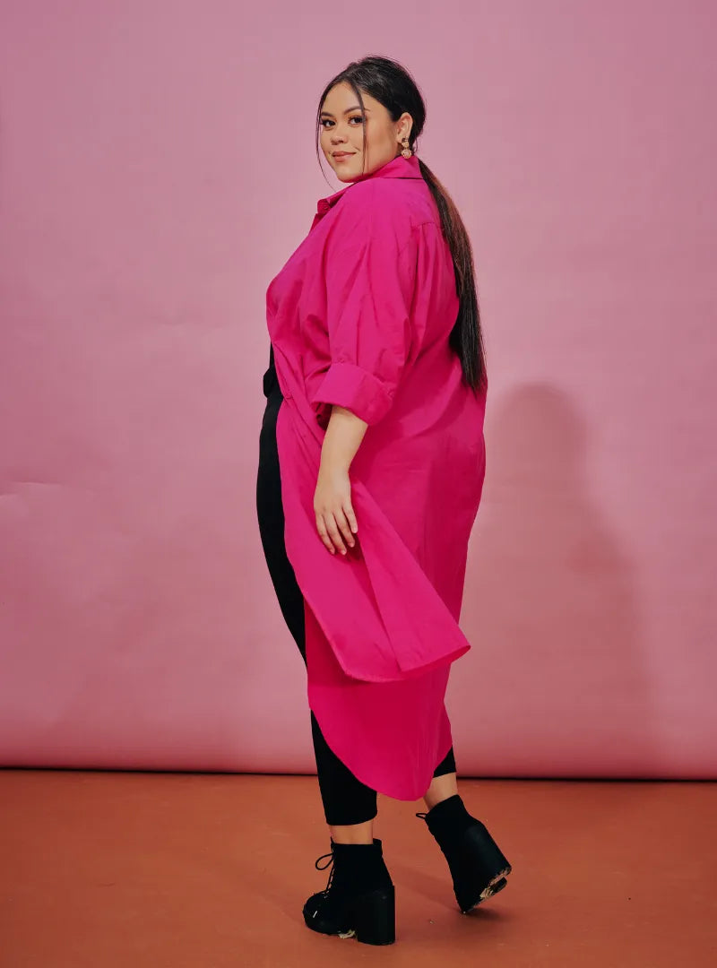 A woman dressed in Hot Pink Longline Oversized Cotton Shirt Dress