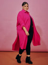 A woman dressed in Hot Pink Longline Oversized Cotton Shirt Dress