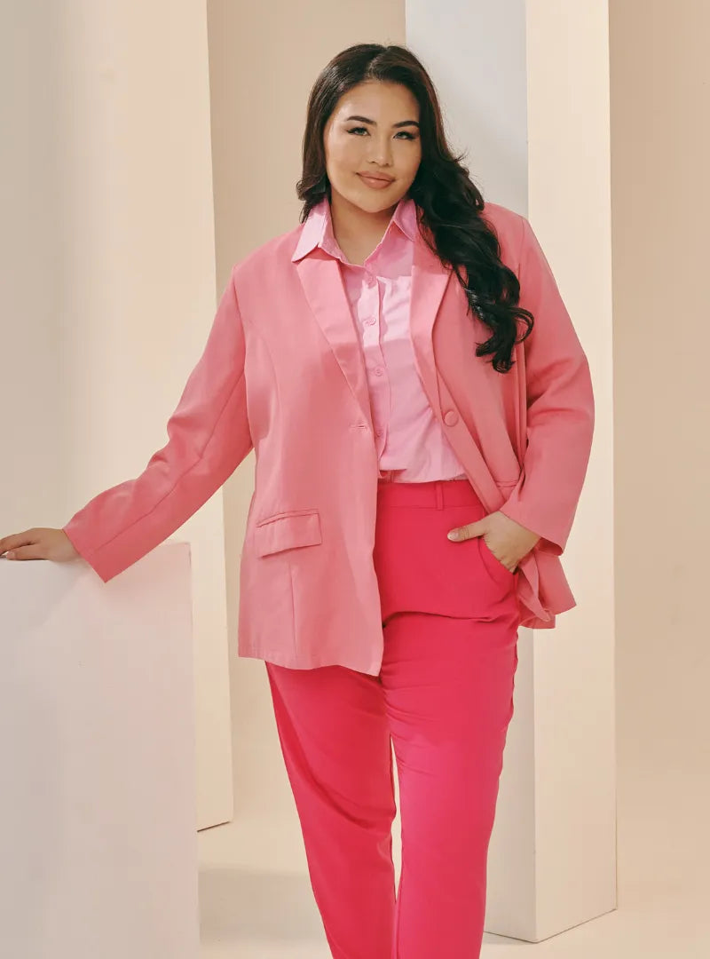 A woman dressed in Juicy Doll Lapel Collar Oversized Blazer